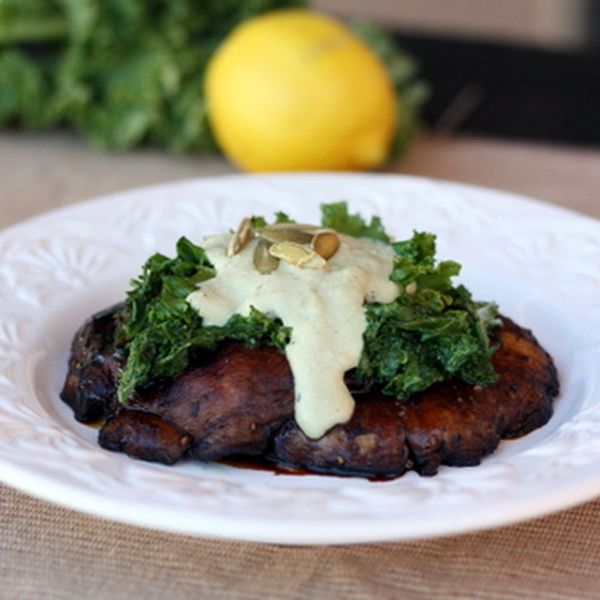 Meaty Portobellos and Lemon Kale Topped with Pumpkin Seed Cream