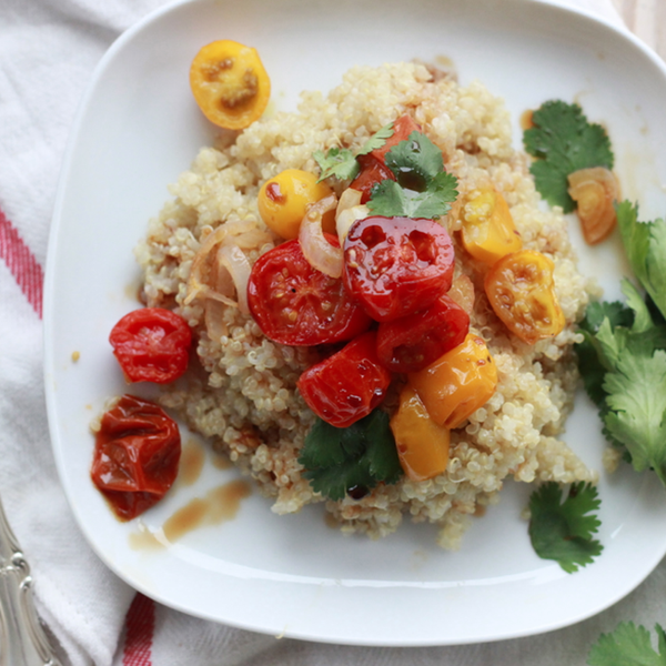 roasted cherry tomatoes + pomegranate molasses over quinoa